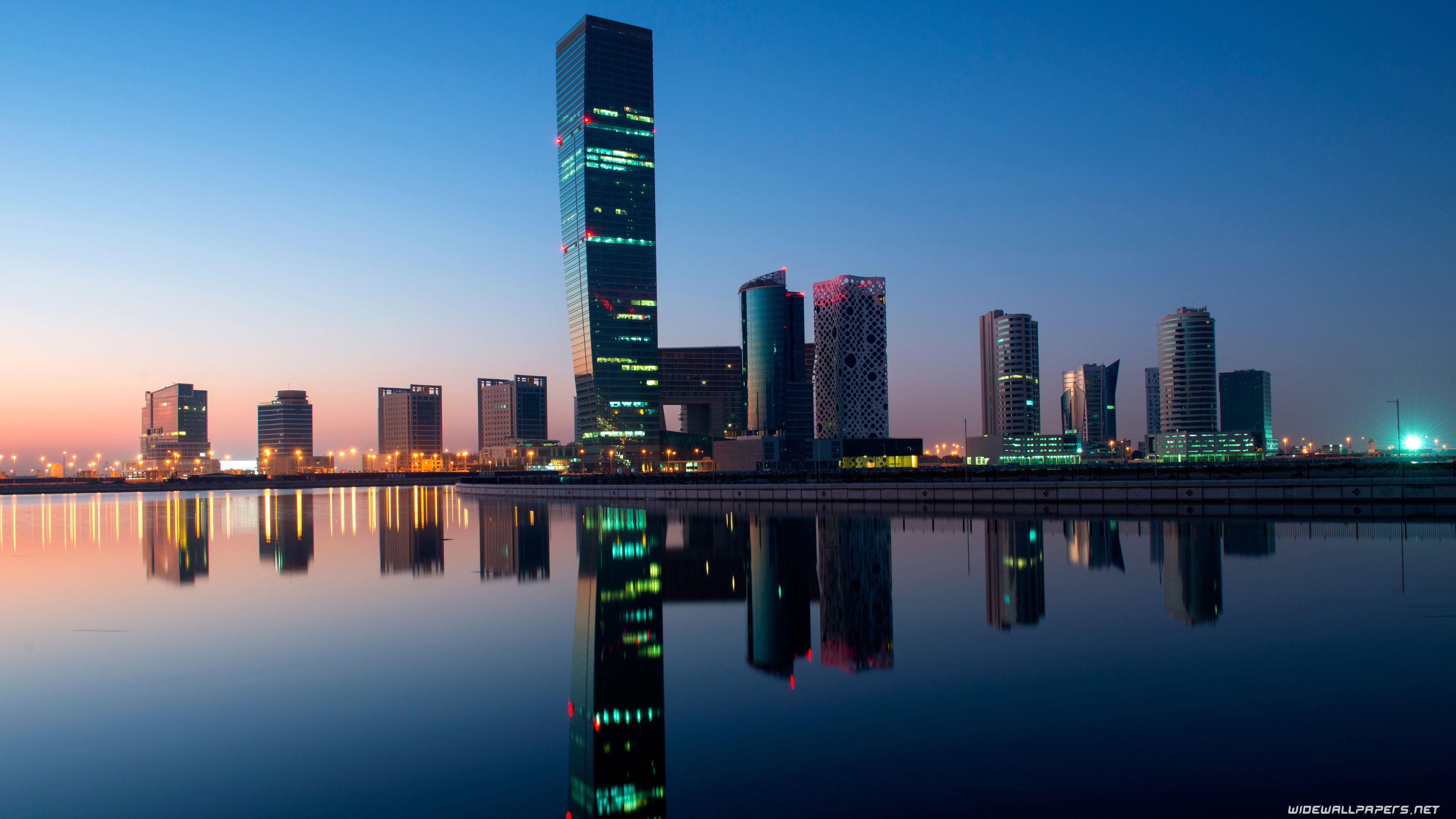 city buildings water reflection