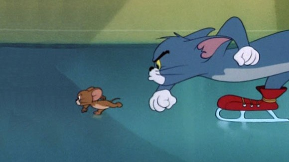 Classic Chase Scene Tom And Jerry Wallpaper