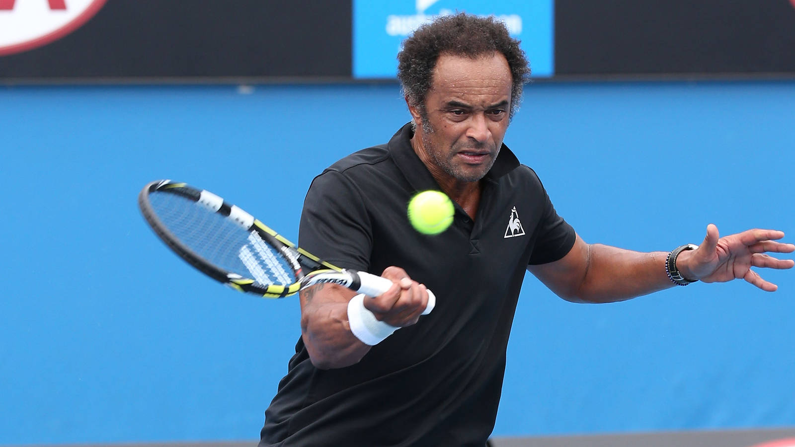 Yannick Noah Forehand Shot Modern Tennis Action Wallpaper