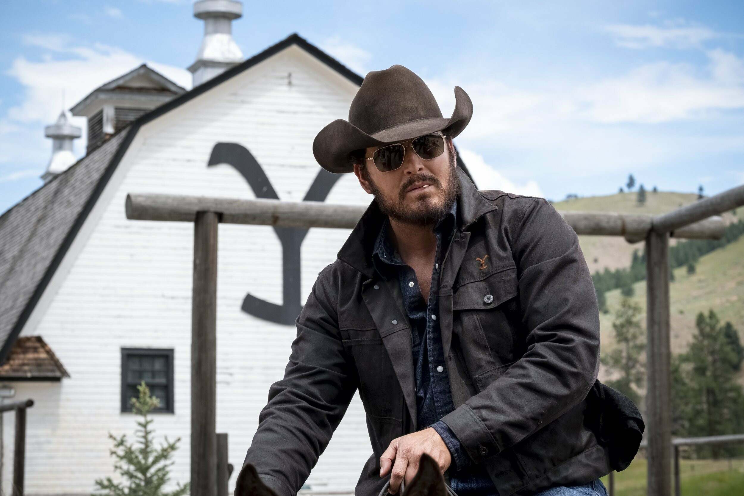 Yellowstone Tv Show Rip Wheeler Cowboy Sunglasses Ranch Dramatic Closeup Wallpaper
