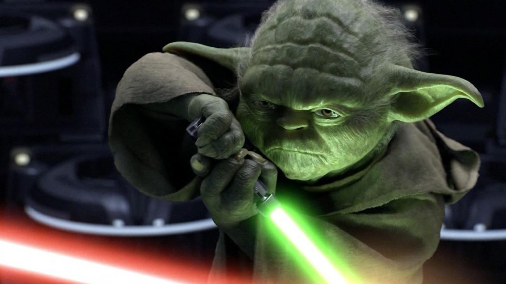 Yoda Green Lightsaber Closeup Star Wars Action Scene Wallpaper