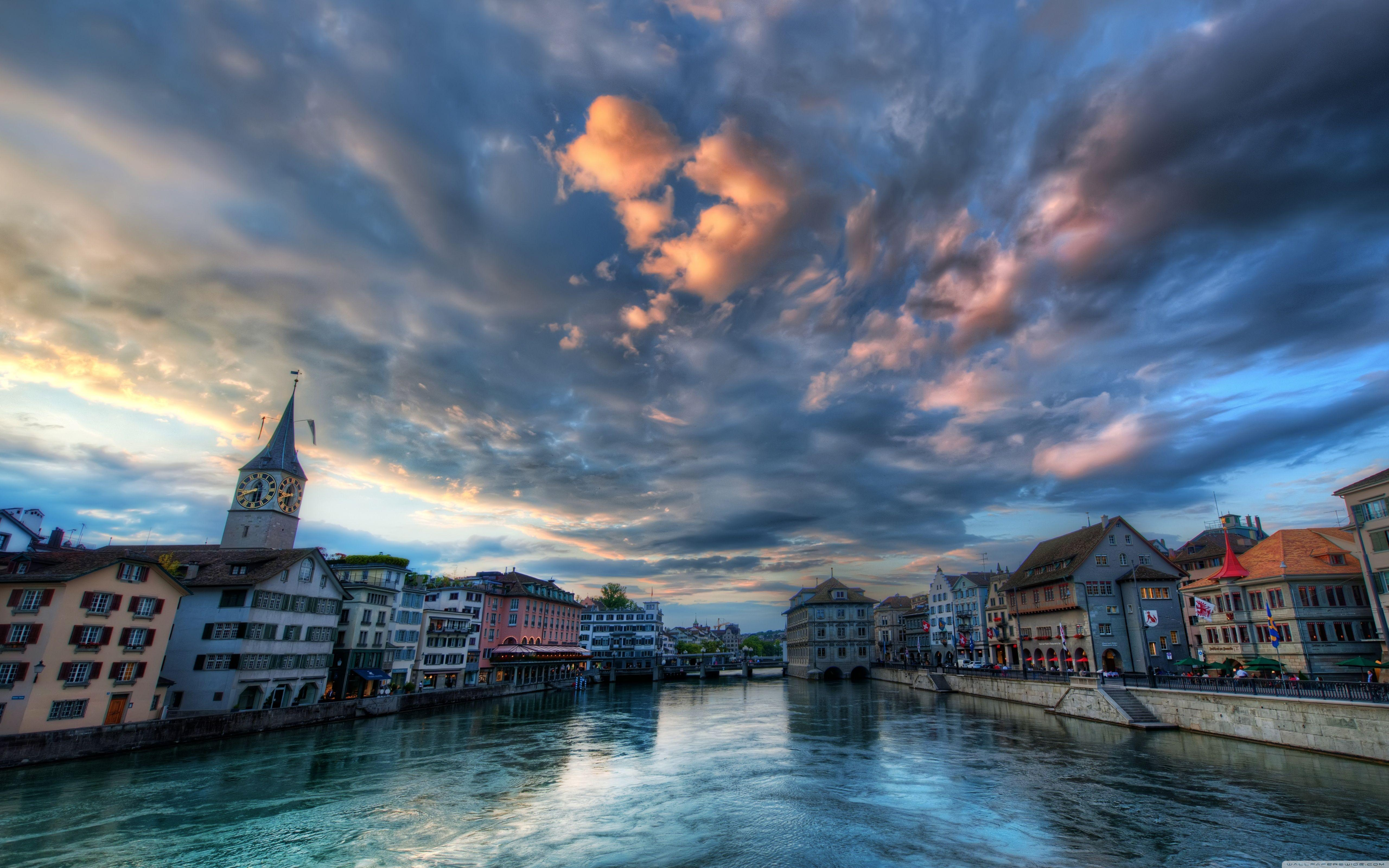 Zurich Limmat River Old Town Dramatic Sky Sunset Clouds Church Clocktower Switzerland Wallpaper