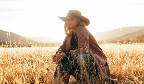 yellowstone tv show beth dutton cowgirl field sunset portrait
